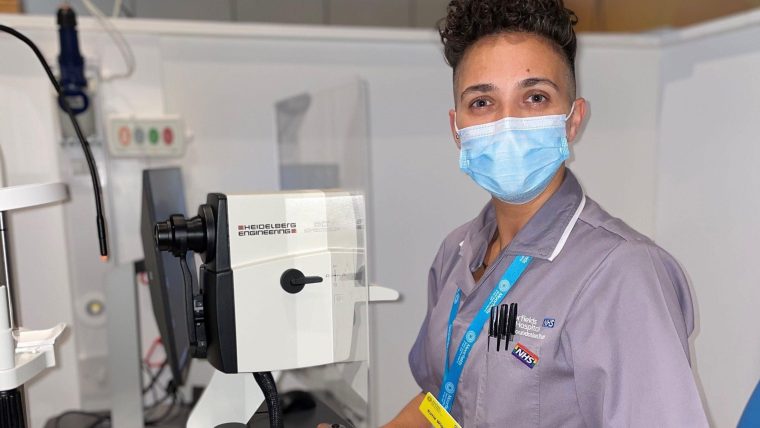 Katie at work in Moorfields using a machine