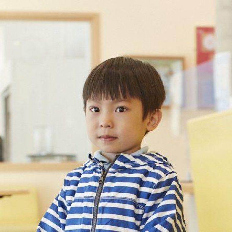 A head shot of a young boy